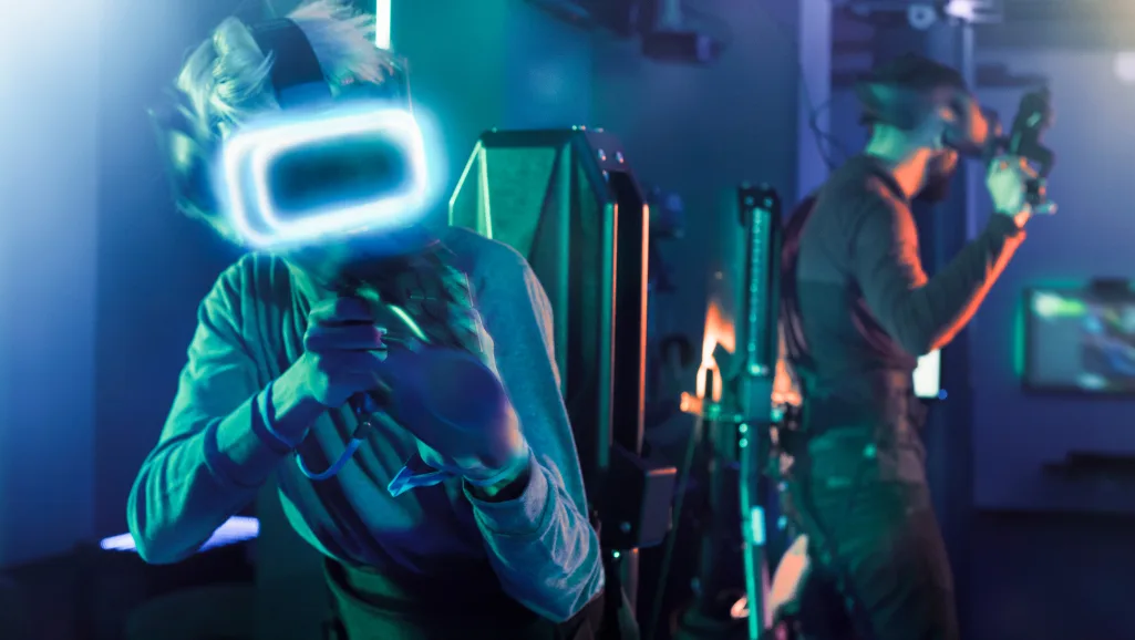 A high-quality, detailed rendering of a DataGlove device, a pioneering virtual reality input interface developed by VPL Research in the late 1980s. The DataGlove is shown in the foreground, its sleek black exoskeleton design with embedded sensors clearly visible. The middle ground depicts the DataGlove connected to a computer system, hinting at its role in enabling immersive VR experiences. The background features a clean, minimalist laboratory setting, conveying the research and innovation that gave rise to this groundbreaking technology. The lighting is soft and evenly distributed, highlighting the DataGlove's intricate mechanical components and emphasizing its futuristic, almost organic aesthetic. The overall atmosphere is one of technological sophistication and the dawn of a new era of virtual reality.